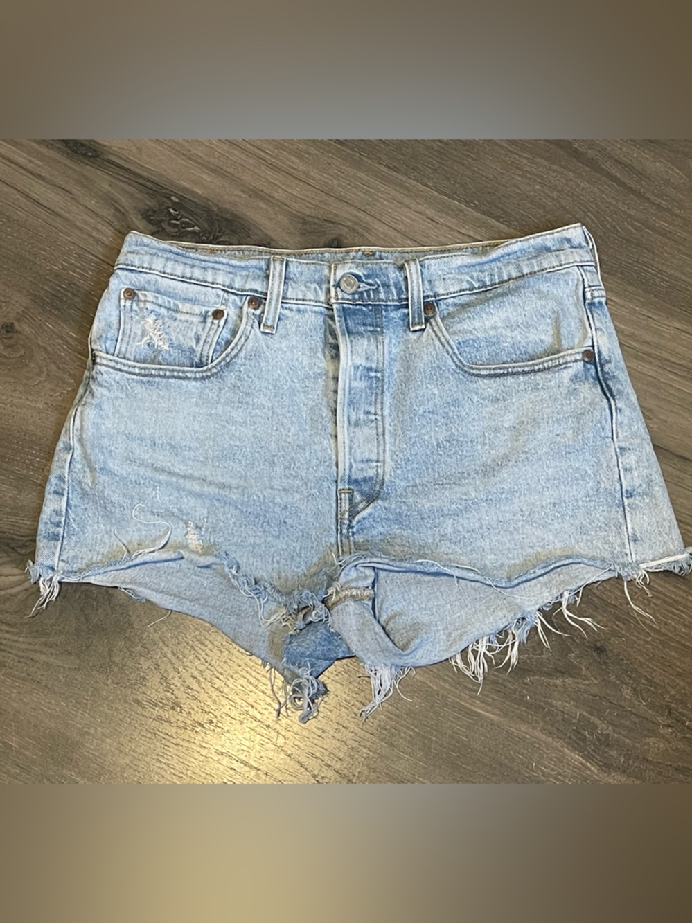 Levi's Light Wash Frayed Denim 501 Cutoff Shorts